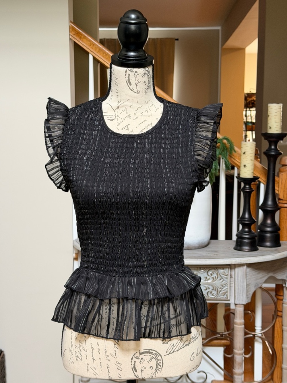 Chaser Black Ruffled Smocked Peplum Top